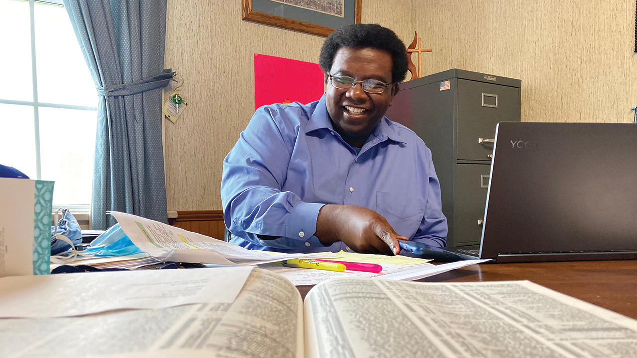 Aldana Allen works in his office at Providence United Methodist Church. — Yonat Shimron/RNS