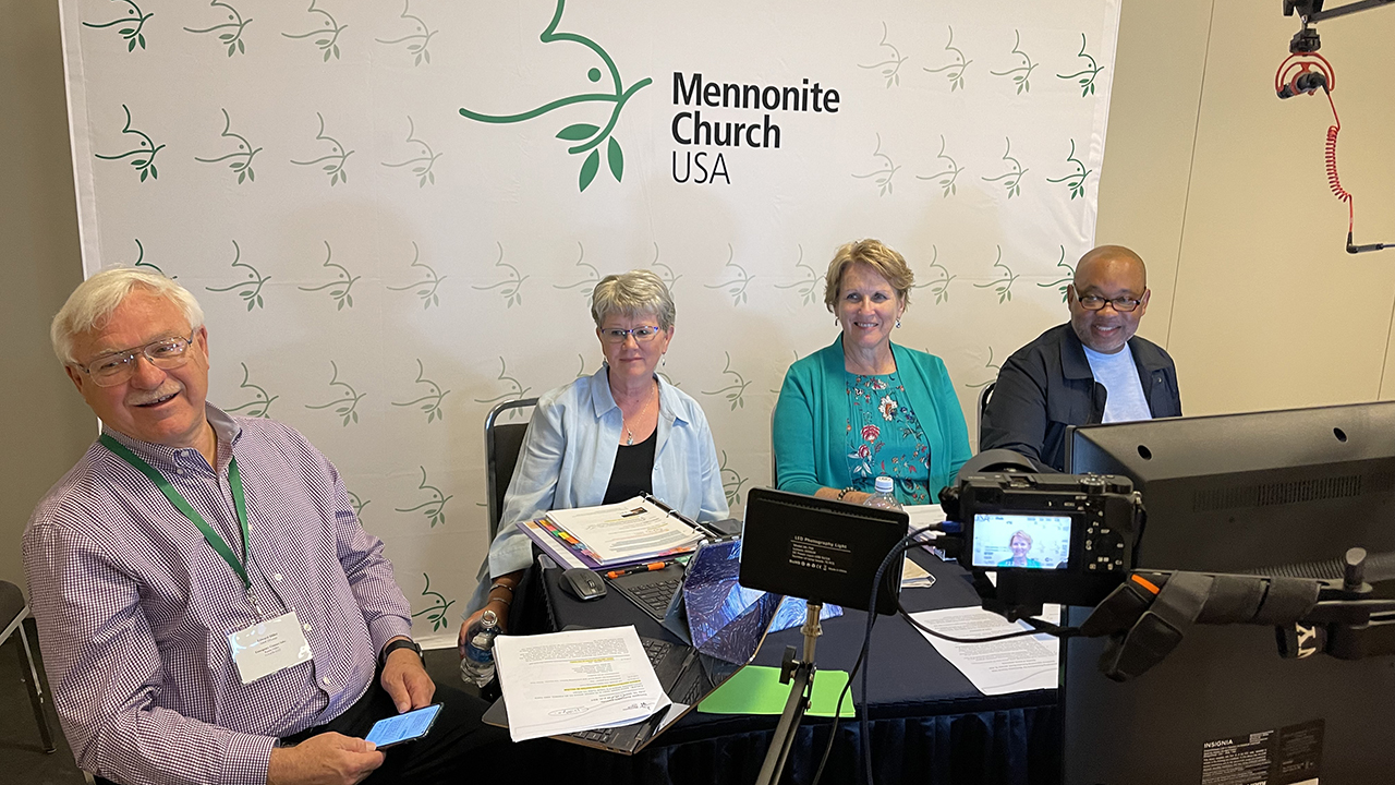 Leading the Mennonite Church USA virtual delegate assembly on July 10 in Cincinnati are, from left, Ed Diller, parliamentarian; Linda Dibble, moderator-elect; Joy Sutter, moderator; and Glen Guyton, executive director. — Mennonite Church USA
