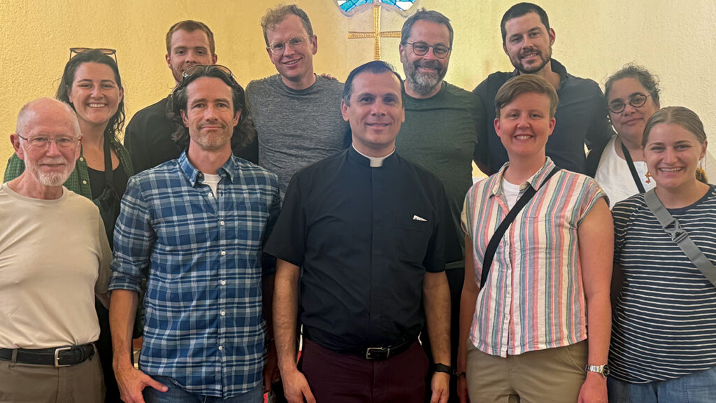 Lutheran Pastor Munther, center, is joined by the Mennonite Action delegation during a visit in Ramallah. — Mennonite Action