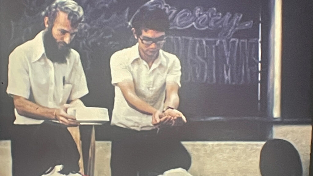 James Klassen takes part in a baptism on Christmas Day in 1975 in Vietnam. — Courtesy of James Klassen