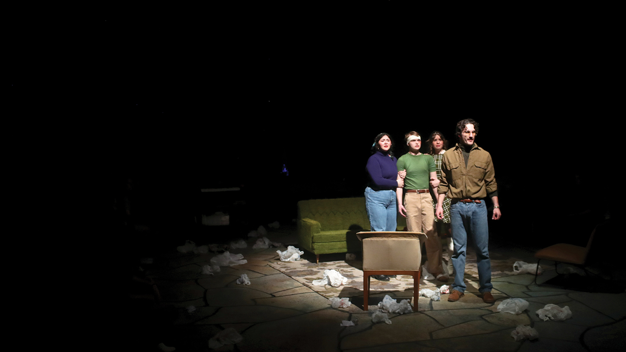 In the Northwestern College production of An Enemy of the People, the Stockmann family stands alone in their home as a mob approaches. — Josh Harrell