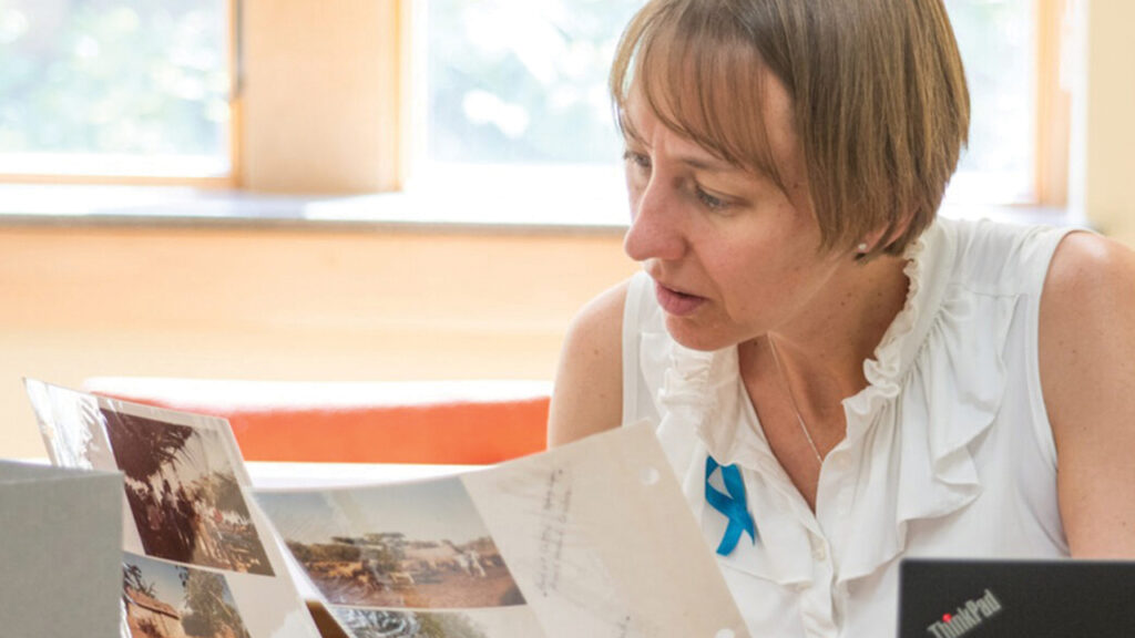 Anicka Fast searches for photos in the Mennonite Church USA Archives. — David Fast/MMN