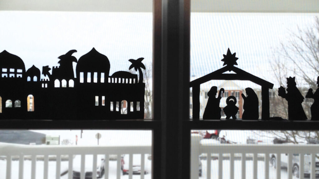 A Haitian nativity, cut out of a steel drum, fills two side-by-side windowsills. — Courtesy of Shirley Yoder Brubaker