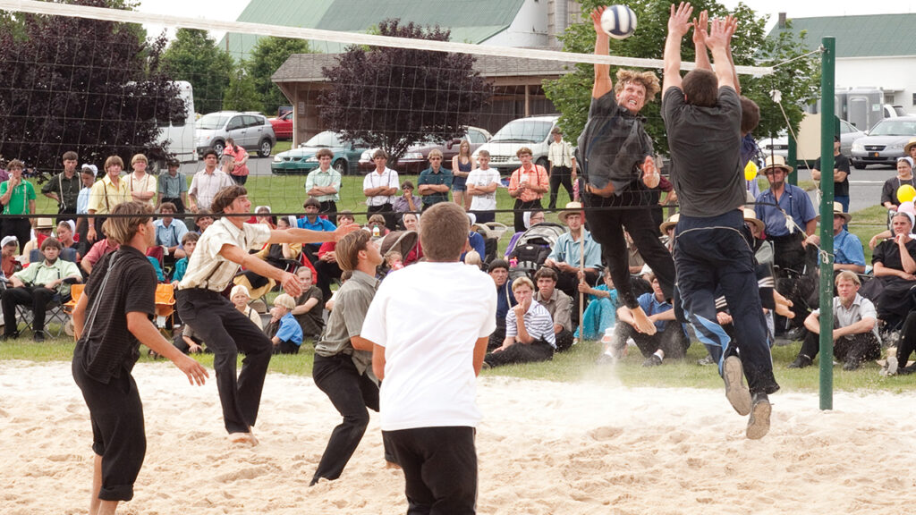 Old Order Amish and others play volleyball during Intercourse Heritage Days in Lancaster County, Pa., several years ago. — Jonathan Charles