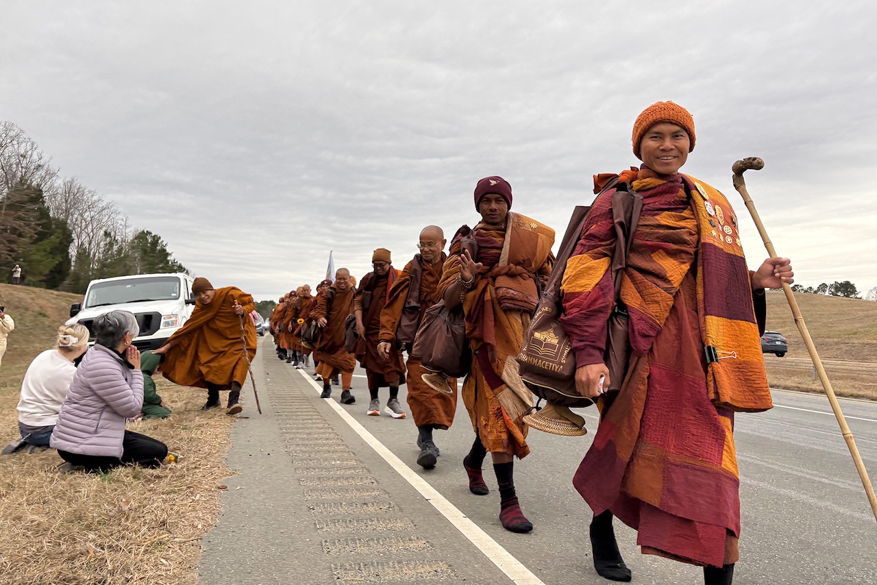 Thousands show their respect for Buddhist monks on a Walk for Peace