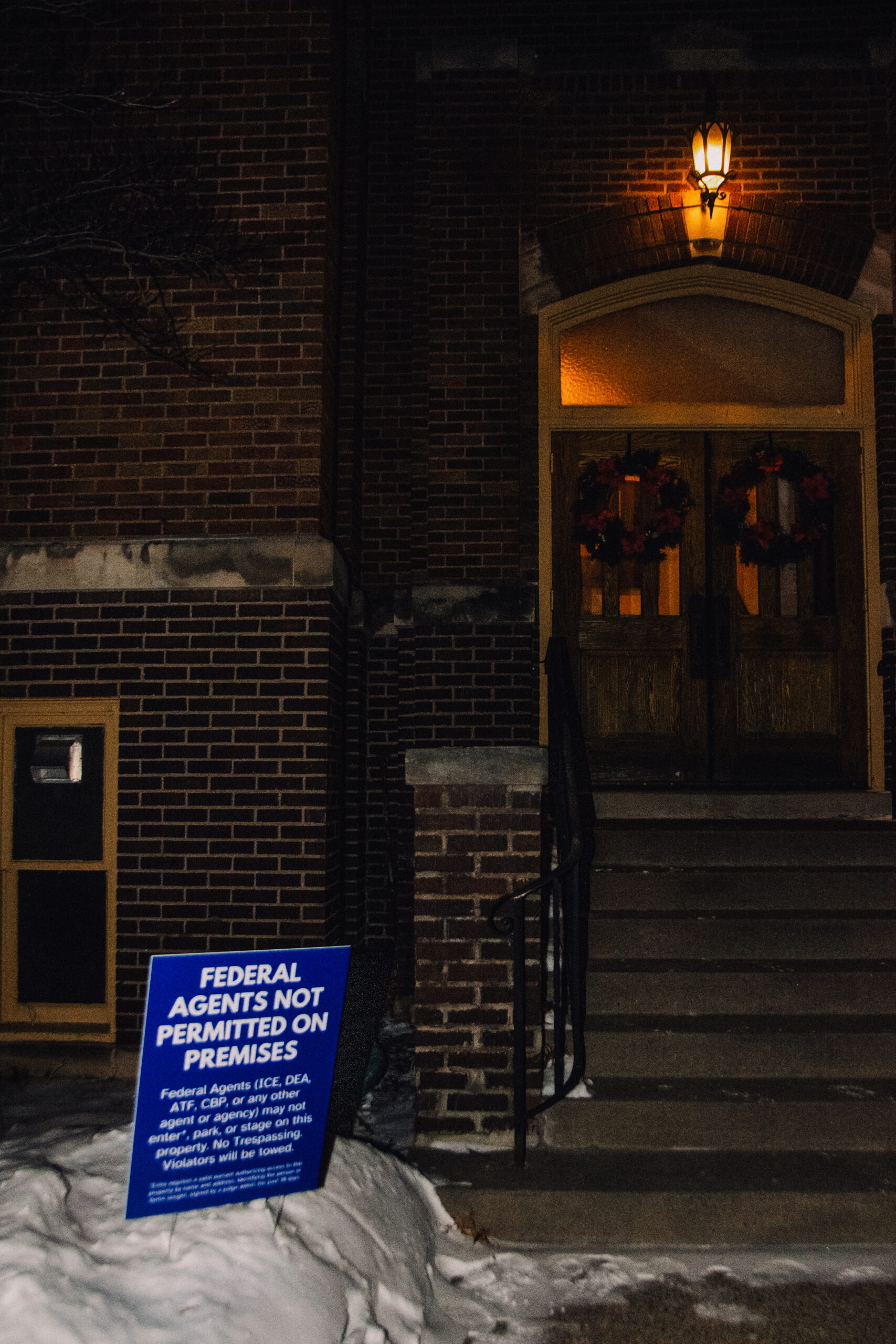 A sign at a Mennonite candlelight vigil after the murder of Alex Pretti, Jan. 24. — Juan Moya/AW